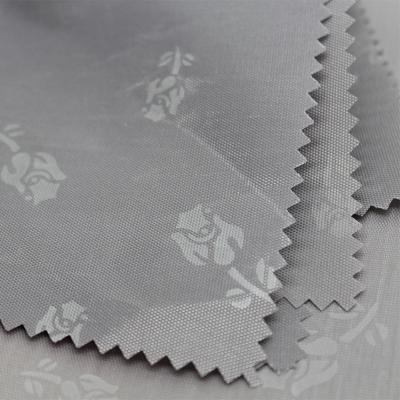 China Waterproof bags lining fabric supplier Oxford 150D 100 polyester PU coated embossed bags lining fabric for sale