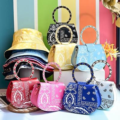 China 2021 Portable Bag PU Women's Bag Cashew Flower Round Woven Handle Shell Spring And Oblique Cross Chain Summer for sale