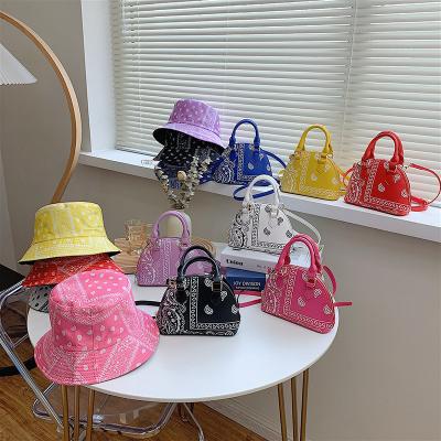 China Famous brands designer handbags hat and purse set bags cashew flower women handbags ladies handbags for sale