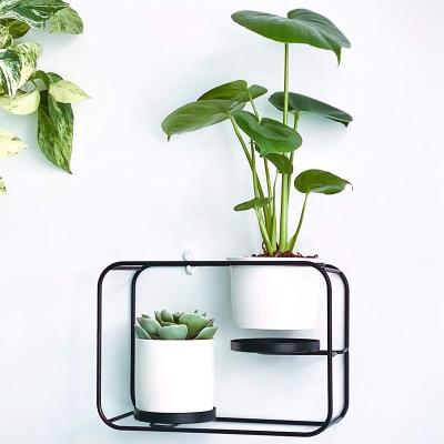 China Modern Design Minimalist Wall Plant Stand with 2 Pots Ceramic Wall Mounts Double Function as a Wall Planter for sale