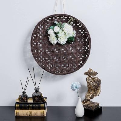 China Traditional Rustic Farmhouse Round Bamboo Baskets For Wall Decor Handmade Woven Basket for sale