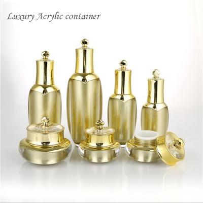 China BEAUTY PACKAGING wholesale golden color luxury acrylic skin care lotion bottle crown shape acrylic jar for sale