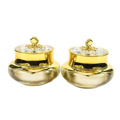 China 50G Luxury Acrylic Plastic Eye Cream Cosmetic Empty Face Packing Jar With Gold Metal Crown Lid for sale