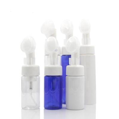 China Personal Care Empty 100ML 200 ML PET Plastic Face Cleaning Foam Bottle mousse Bottle with Silicone Brush for sale