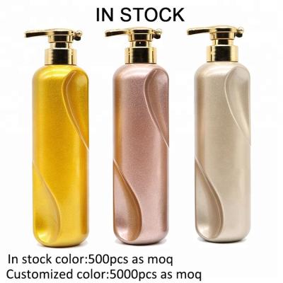 China Personal Care Factory Wholesale Good Quality Gold Flat Color Glossy PET Bottle With Pump 500ml for sale