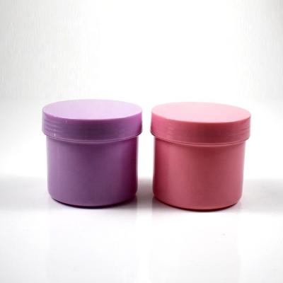 China Empty skin care cream pink and purple sample plastic containers 150 gram jar round cosmetic jars for sale