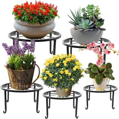 China 4mm Metal Outdoor Plant Stand Round Shelf for Planter Rustproof Iron Vintage Garden Decor for sale