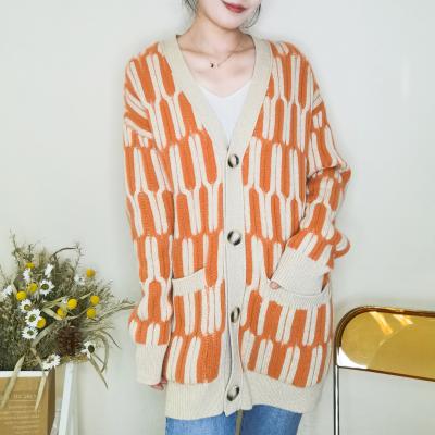 China Anti-wrinkle hot sale v-neck design cashmere orange square loose cardigan knitted sweater for woman for sale