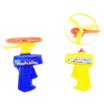 China Small Disc Gun Shooter Toy Gun Flight Wind Up Spring Airplane Toy For Kids Flying Airplane Toys for sale