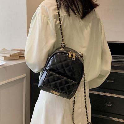 China 2023 New Chain Small Waterproof Female Travel Mini Diamond Bag Solid Color Leisure Quilted Backpack For Lady for sale