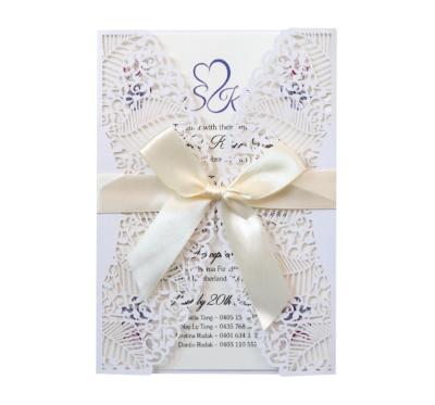 China Europe Factory Laser Leave Style Wedding Invitation DIY Hollow Paper Greeting Cards With Bow for sale