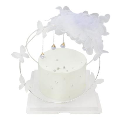 China New Romantic French Rotating Cake Topper Butterfly Cake Topper Ornaments Feather Ring Birthday Cake Decoration for sale