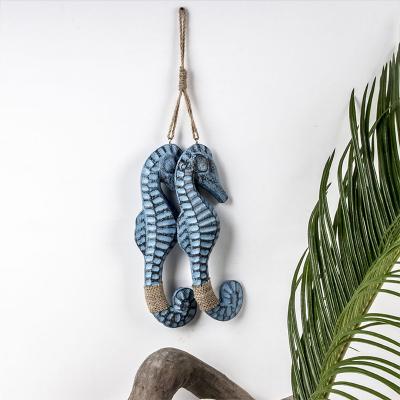 China Trendy Christmas Seahorse Wooden Christmas Ornament Wall Hanging Home Decorative Pendant for sale