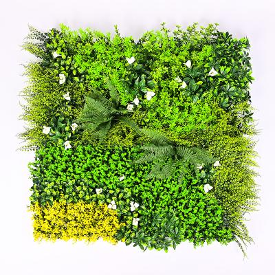 China Plastic Indoor Outdoor Decorative UV Resistant Green Leaves Plant Panel Faux Vertical Garden Artificial Grass Wall for sale