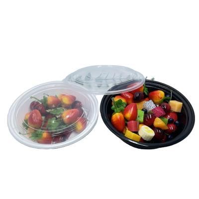 China Freshness Preservation 850ml 29oz Disposable Plastic Black White Round PP Microwavable Food Packaging Container With Lid for sale