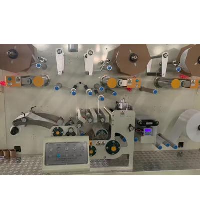 China High Speed ​​Computer Controlled Nonwoven Tape Diaper Products Side Cut Composite Laminating Machine S for sale