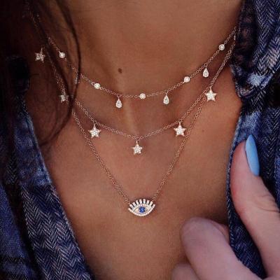 China Fashion TRENDY Multi Layered Chain Necklaces For Star Moon Small Drop Eyes Pendant CZ Trendy Jewelry Female Mixed Infinity Choker for sale