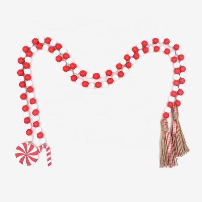 China Unique Christmas Wood Beaded Garland Tassel Farmhouse Christmas Jute for tying painted wooden beads for sale