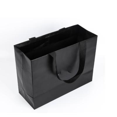 China Recyclable Christmas Gift Bag Shopping Bag Kraft Paper Bag Handle for sale