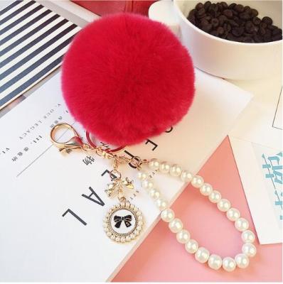 China Cute Metal Fashion Pom Pom Plush Key Chain for sale