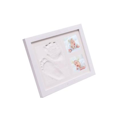 China 23*28cm Wooden Baby Handprint and Footprint Clay Newborn Baby Photo Frame for Kids Gift for sale