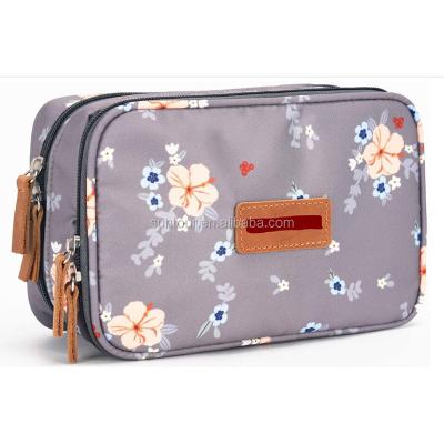 China Hot Selling Fashion M Size Clutch Sling Waterproof Multifunctional Travel Make Up Cosmetic Bag for sale