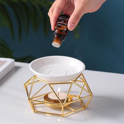 China AROMATIC Wholesale Geometric Candle Metal Gold Metal Aroma Essential Oil Burner Wax Melt Ceramic Burner AROMATIC Tealight for sale