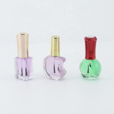 China Luxury 12ml Cosmetic Packaging 15ml Nail Polish Clear Glass Bottle With Rose Gold Cap And Brush for sale