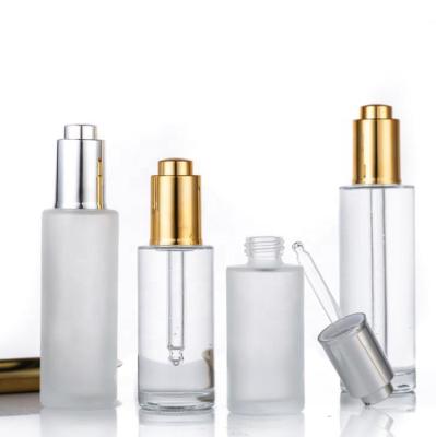 China Wholesale Cosmetic Cosmetic Packaging Clear Frosted Glass Bottle With Gold Sliver Dropper For Essential Oil for sale