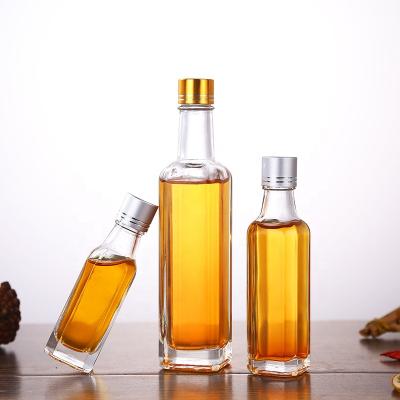 China Food Mini 30ml 50ml 100ml Clear Square Glass Olive Oil Sauce Bottle With Screw Cap for sale