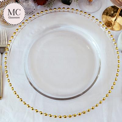 China Glass Beaded Plate Sustainable Wedding Antique Gold Rim Charger for sale