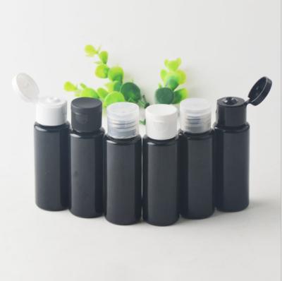 China Household Products 35ml PET Color Plastic Black Flat Shoulder Cosmetic Shampoo Toner Bottle With Flip Cap for sale