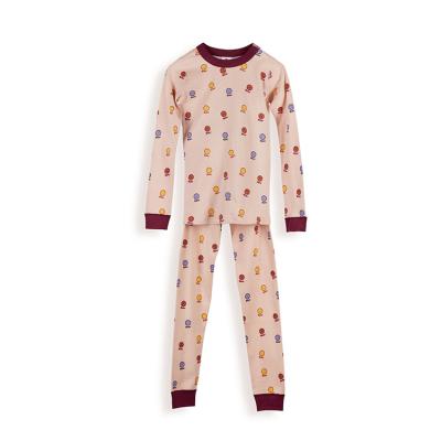 China Smooth Soft Snug Fit with High Yarned Textile Kids' 100% Organic Cotton Button Long Sleeve Pajamas for sale