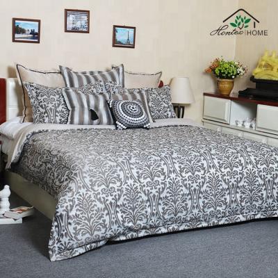 China Nondisposable luxury jacquard fabric bedsheet luxury comforter set Bohemian 9 piece lace bedding set wholesaler hotel set single bedskirt for sale