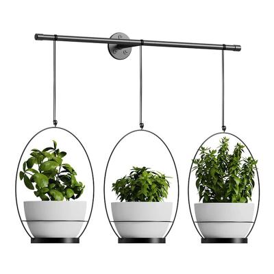 China Plant Hanger Metal Stocked Hanging Planter with 3 Flower Pots Decor Planter Pots Modern Home Potted Plant Rack for sale