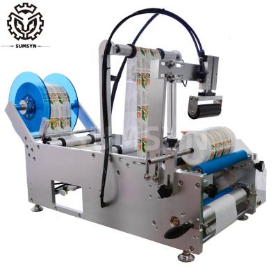 Cina Semi automatic round bottle labeling machine flat square bottle label printing machine shampoo honey Jar tube cans etiquetadora in vendita