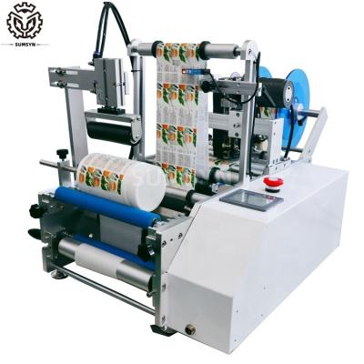 Cina Semi automatic round bottle labeling machine with date printing coding machine jars cans tube wine glass cup labeler in vendita