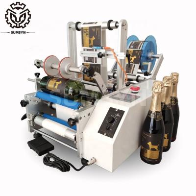 China Desktop semi round bottle labeling machine glass wine PET can bottle applicator for sale