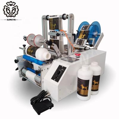 Cina Manual bottle labeling machine double sides labeling machine semi labeling applicator for Jars Cans Soft Tube Wine in vendita