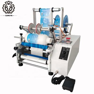 China Manual Gallon bottle labeling machine Semi automatic round bottle labeling machine bottle label dispenser etiquetadora for sale