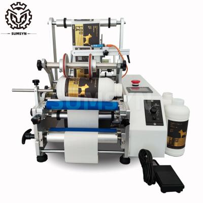 China Manual Gallon bottle labeling machie double sides labeling machine for round bottle Jars Cans Tube Wine Glass Cup product for sale