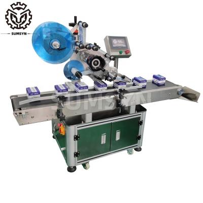 China SUMSYN factory Automatic plane labeling machine and real time printing date for card box carton for sale