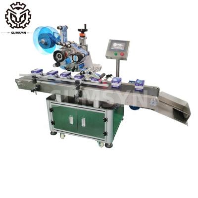 Cina Automatic Plane labeling machine paper plastic box card with printing on label etiquetadora in vendita