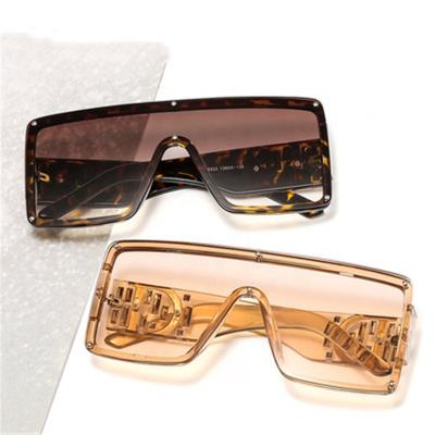 China Women's Wide Leg Fashion Sunglasses Big Letter Sunglasses for sale