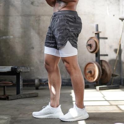 China Anti-Wrinkle Wholesales Custom Mens Compression Workout Shorts With Liner 2 In 1 Esportivo Mesh Fitness Men Gym Shorts With Pocket for sale