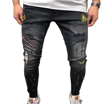 China Plus size 2021 European and American hot men's style hip-hop feet badge slim jeans new tight-fitting ripped men's pants for sale