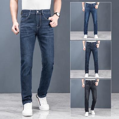 China QUICK DRY business darker than blue jeans pocket men's jeans thickening winter male black jeans dress pants for sale