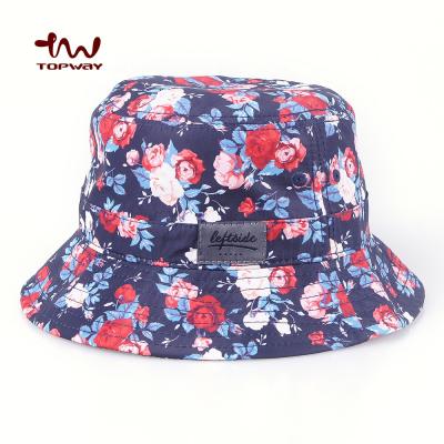 China Custom Woven Image Flower Pattern Bucket Hat Cap Designer Logo Sublimation Printed Bucket Hats Label Logo for sale