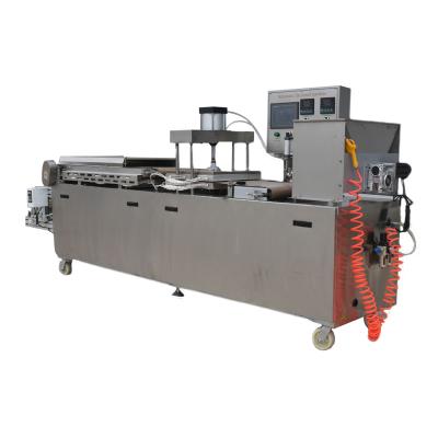 China Hotels Automatic Dough Press Machine Mexican Pizza Tortilla Press Making Machine for sale