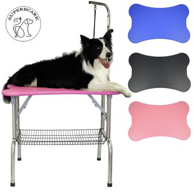 China Sustainable Heavy Duty Stainless Steel Dog Cat Bone Shaped Rubber Surface Grooming Table With Arm / Noose for sale